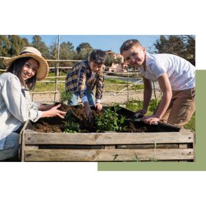 Middle-school students learn about soil and gardening.